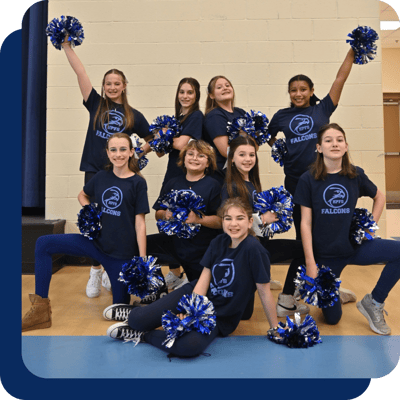 HPFS Cheer squad holding pom-poms