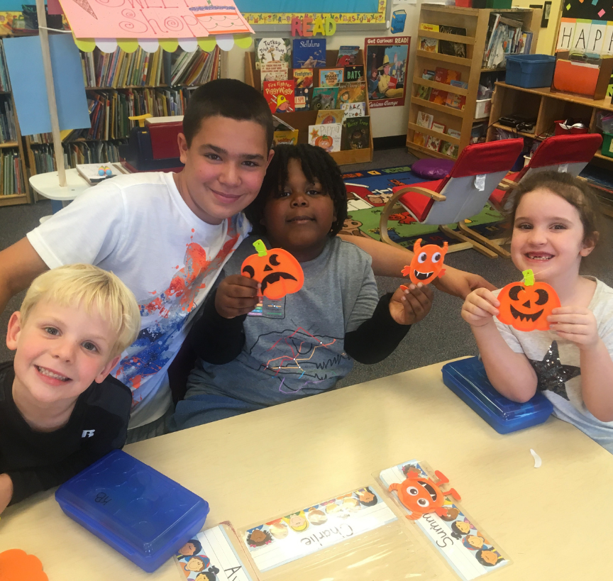Children making fall crafts