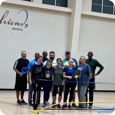 Adults ready to use the pickleball court