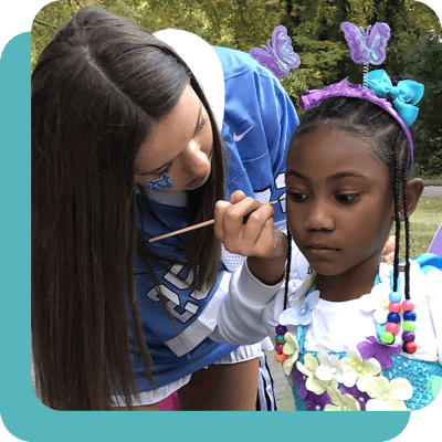 Child getting a face painting